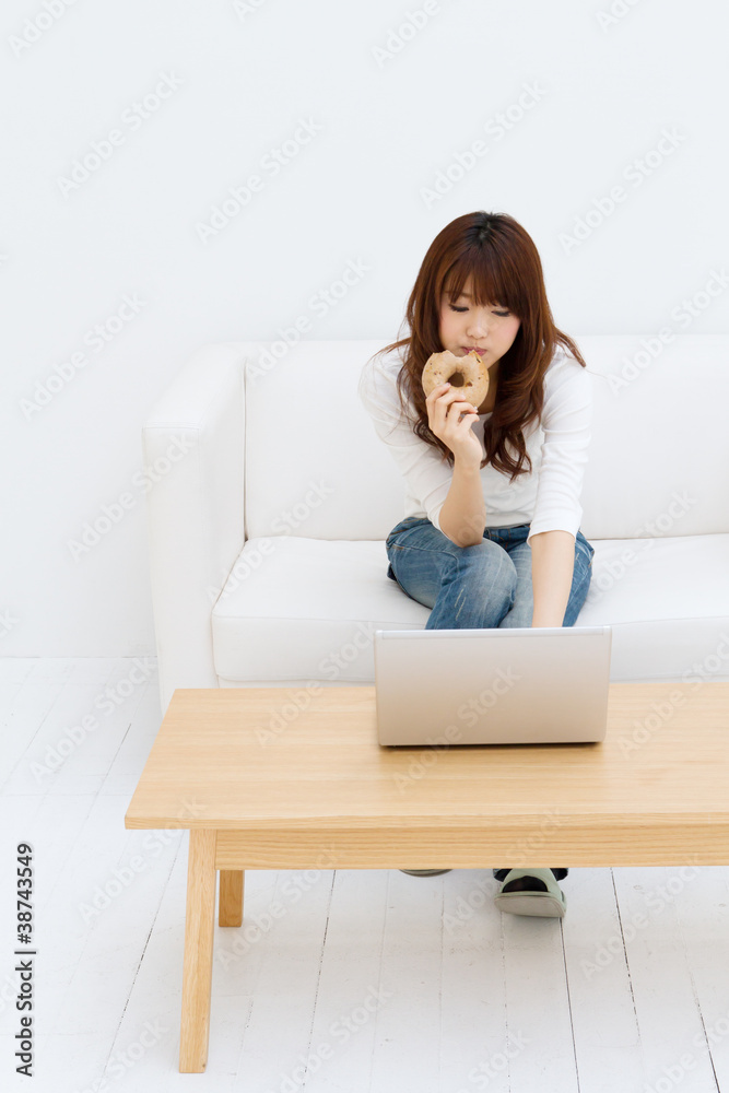 Beautiful young woman using laptop computer Beautiful young woman using laptop computer