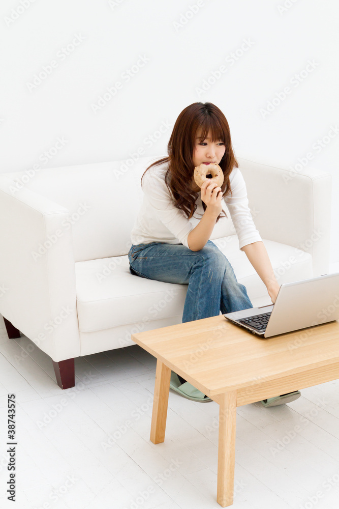 Beautiful young woman using laptop computer Beautiful young woman using laptop computer