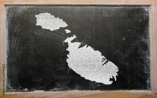 outline map of malta on blackboard