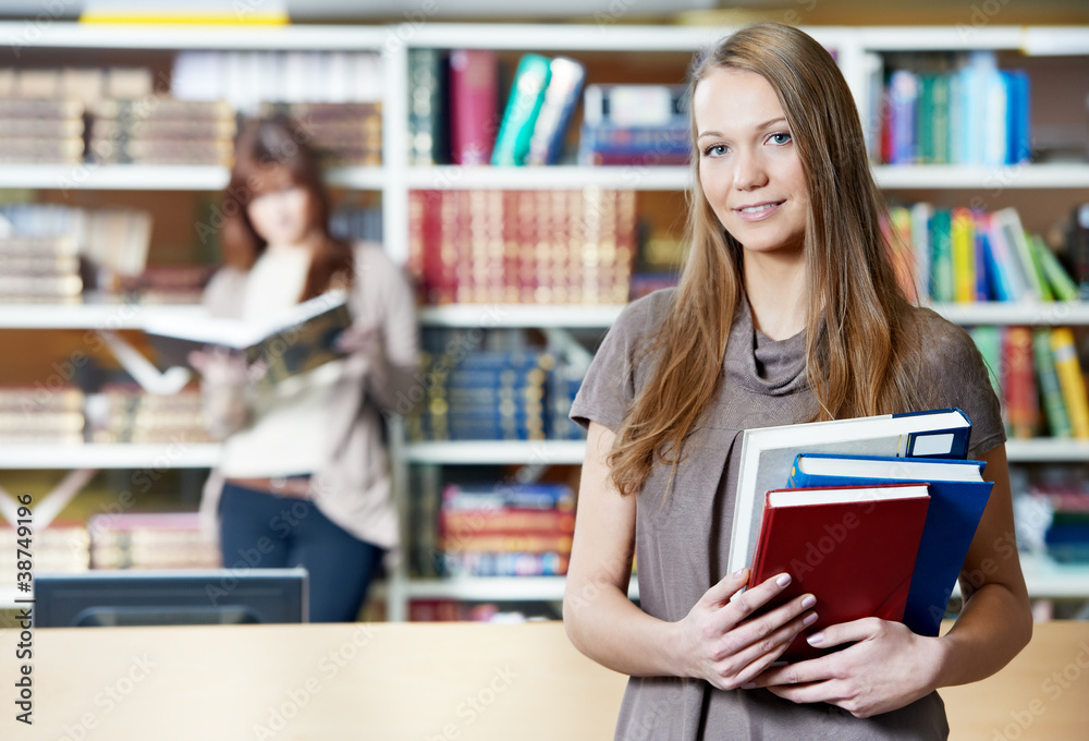 young student girl study with books in library young student girl study with books in library