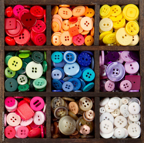 an assortment of buttons arranged by color