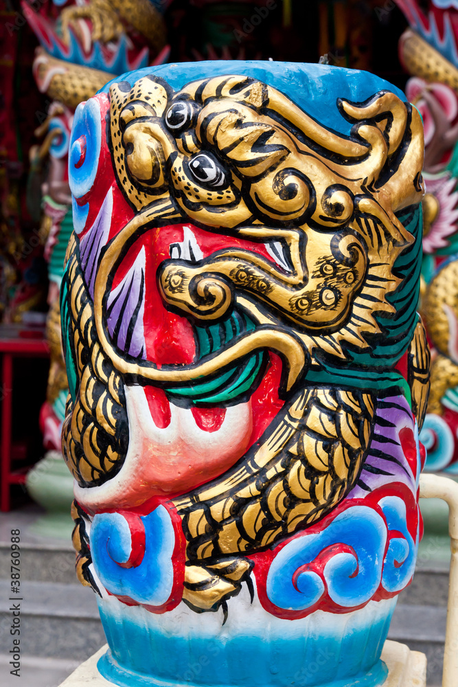 Golden dragon on pillar