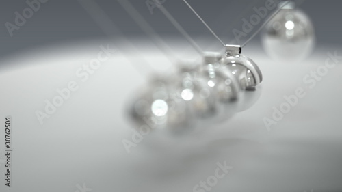 Balancing balls, Newton's cradle. Repeatedly