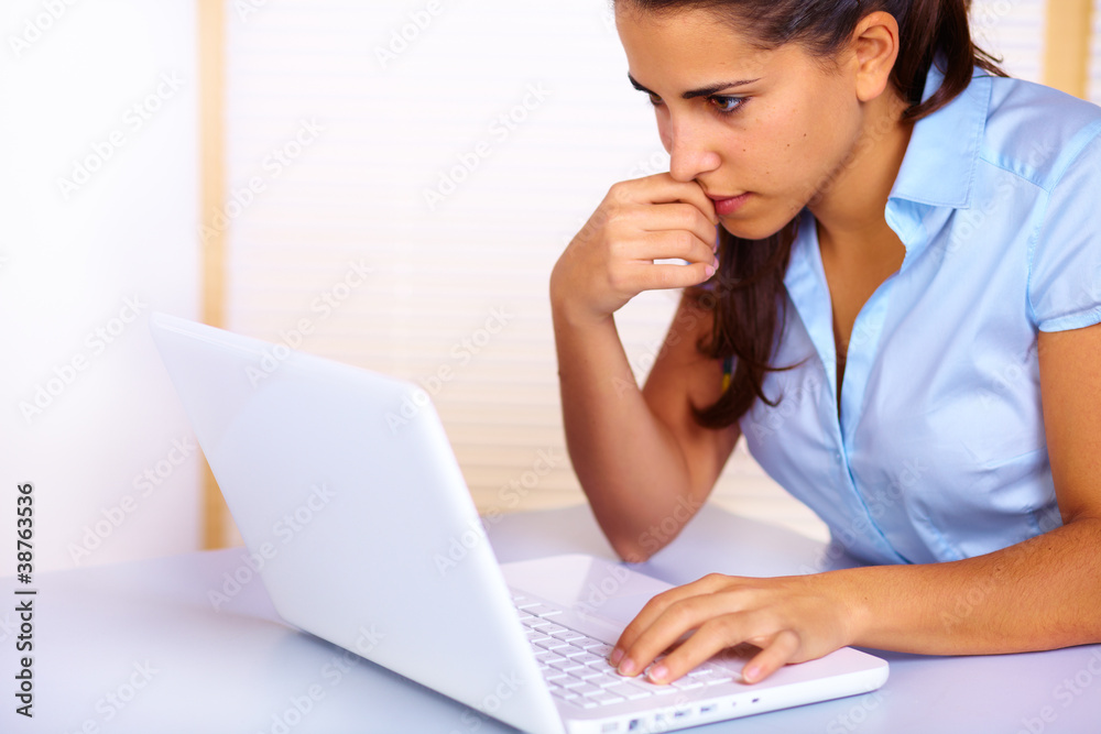 Young woman using a laptop Young woman using a laptop