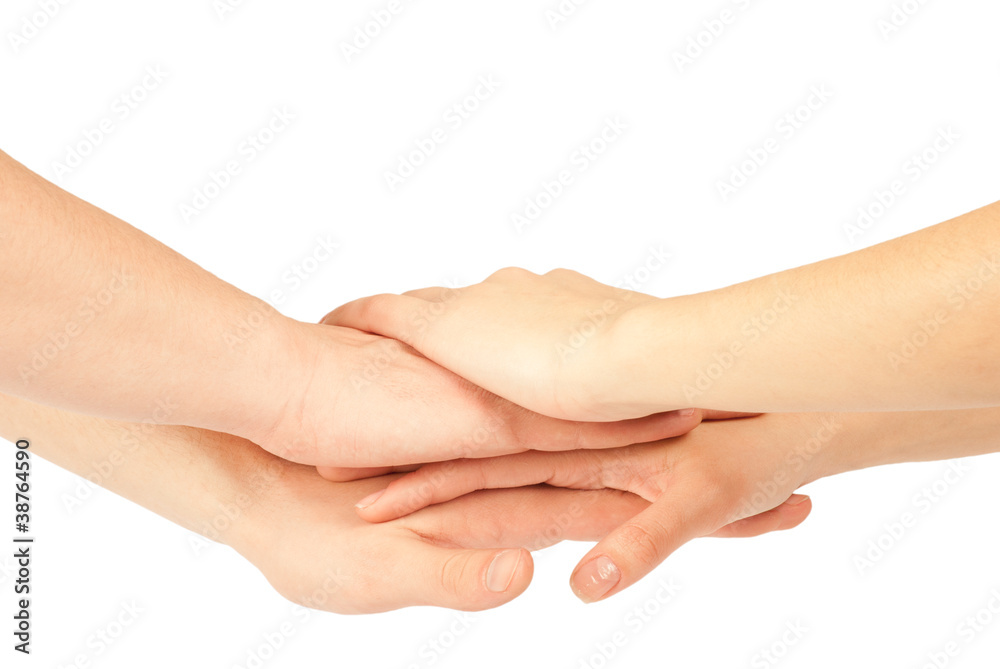 Hands on top of each other. Symbolic picture. Hands on top of each other. Symbolic picture.