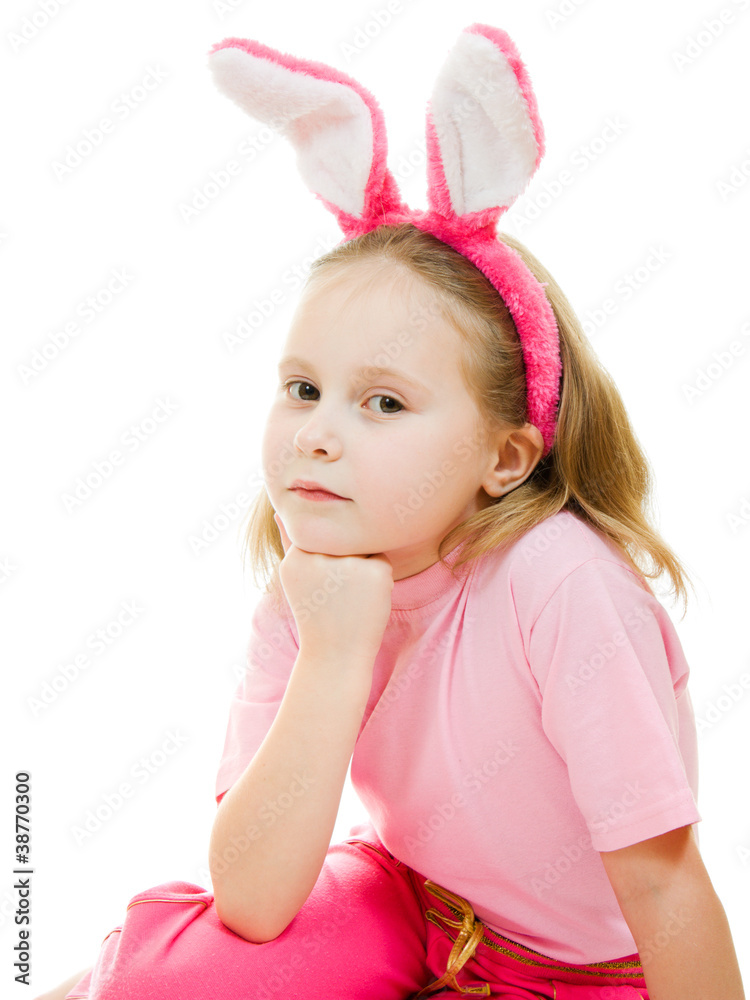 The little girl with pink ears bunny on white background. The little girl with pink ears bunny on white background.