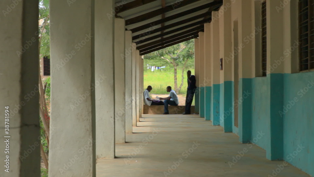 Boys studying in a hallway at a school in Kenya. Boys studying in a hallway at a school in Kenya.