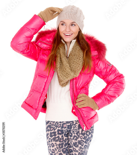 Young woman wearing winter jacket scarf and cap