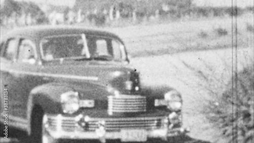 Old Car Drives Up (Archival 1940s)