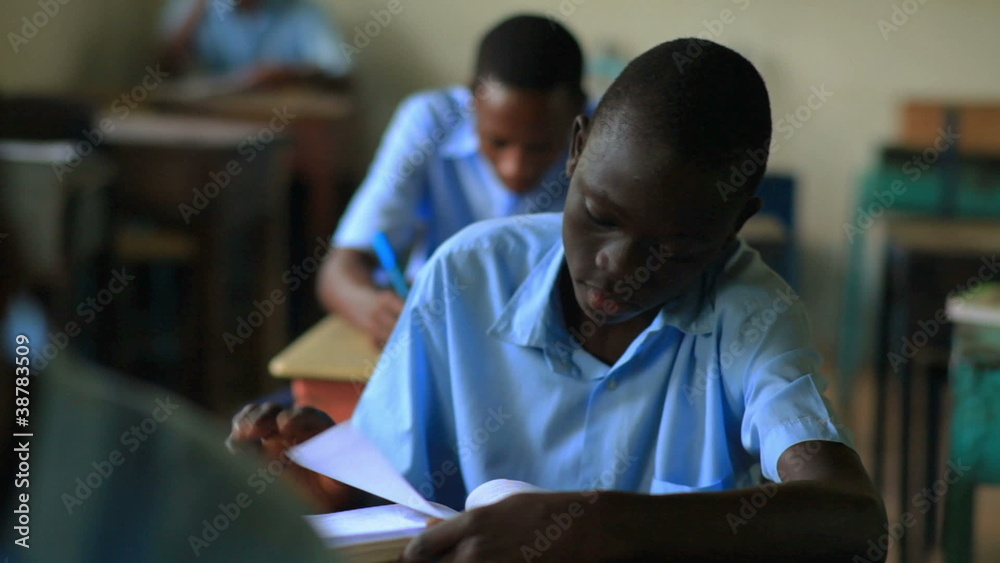 Students taking a test in an African school. Students taking a test in an African school.