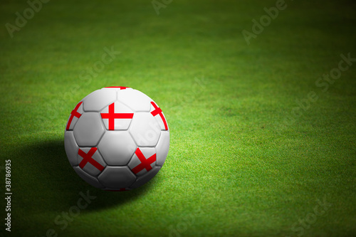 Flag of England with soccer ball over grass - Euro 2012