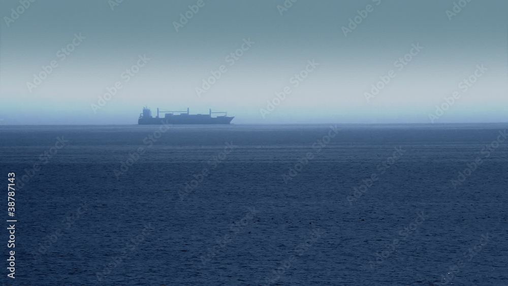 Large Cargo Shipping Boat Crossing the Ocean Large Cargo Shipping Boat Crossing the Ocean