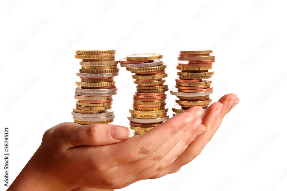 Two young hands offering a pile of Euro coins
