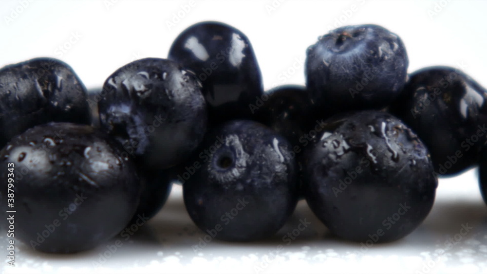 Close up slow pan across blueberries. Close up slow pan across blueberries.