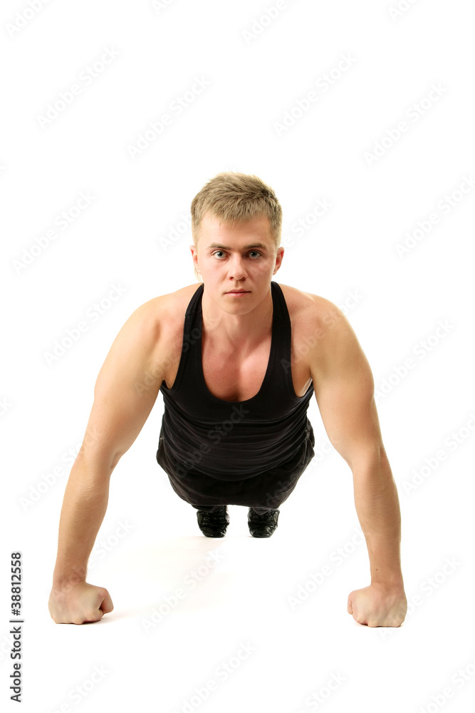 A handsome young man making push-ups A handsome young man making push-ups