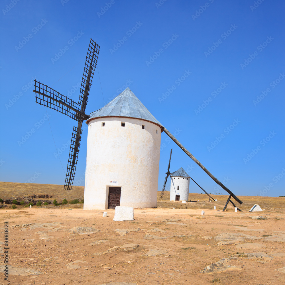 Two windmills. Castile La Mancha, Spain.