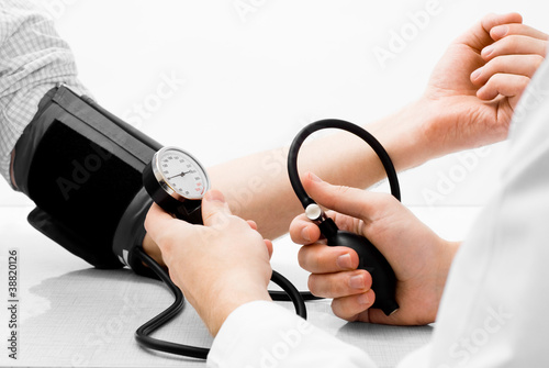 Blood pressure measuring studio shot