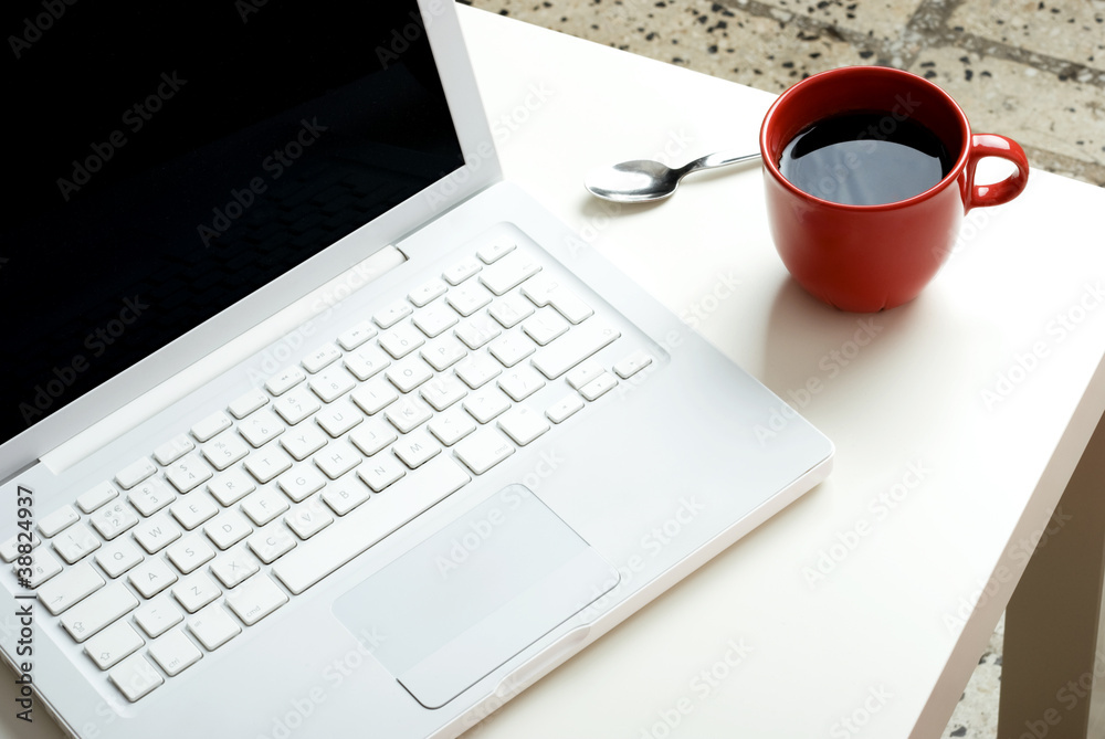 White laptop and coffee White laptop and coffee