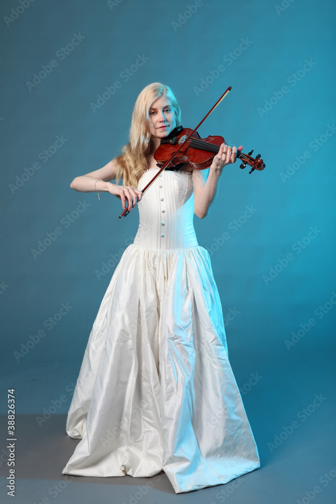 Beautiful young woman with a violin.