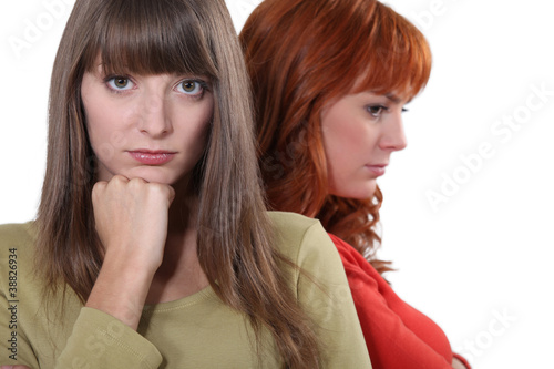 Two upset female friends