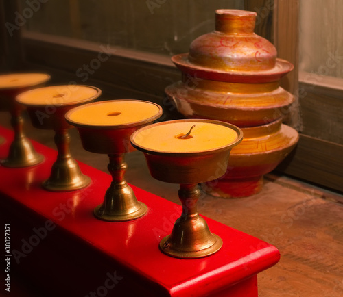 Lucky butter burning lamps and tibet jugs photo