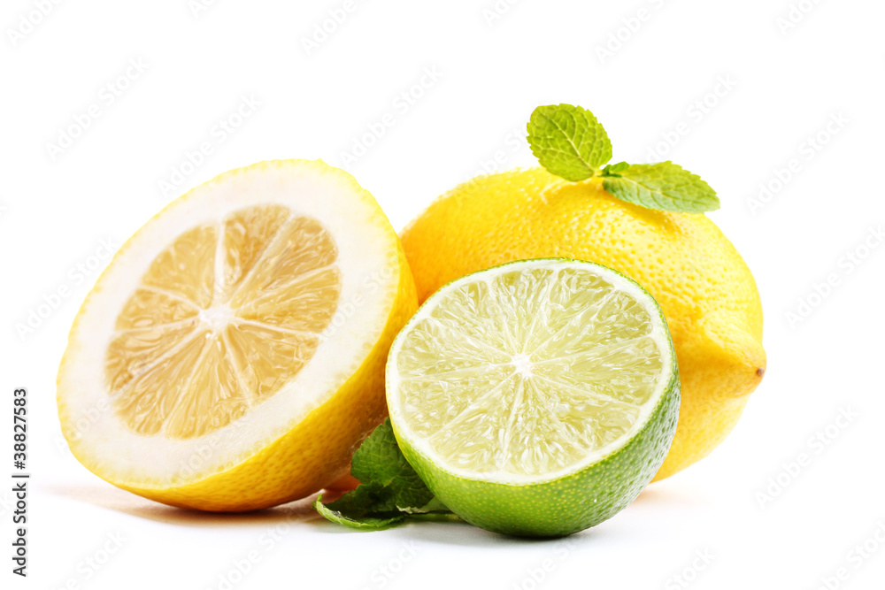 Fresh lime and lemon with mint isolated on white Fresh lime and lemon with mint isolated on white