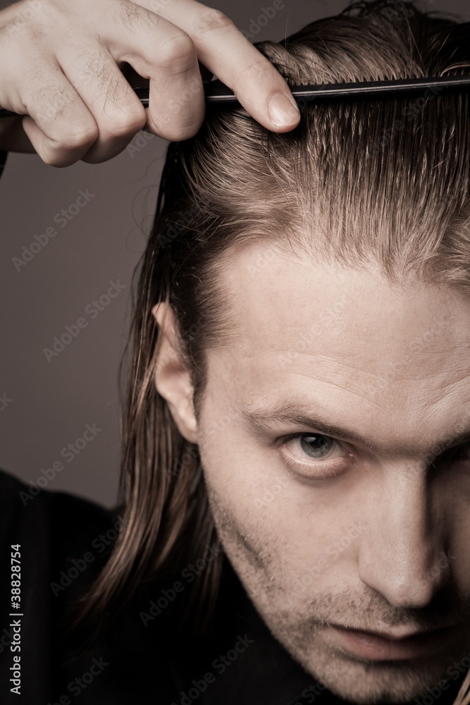 Obraz premium Long-haired man