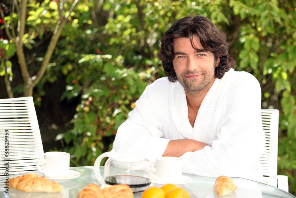 40 years old man having breakfast 40 years old man having breakfast