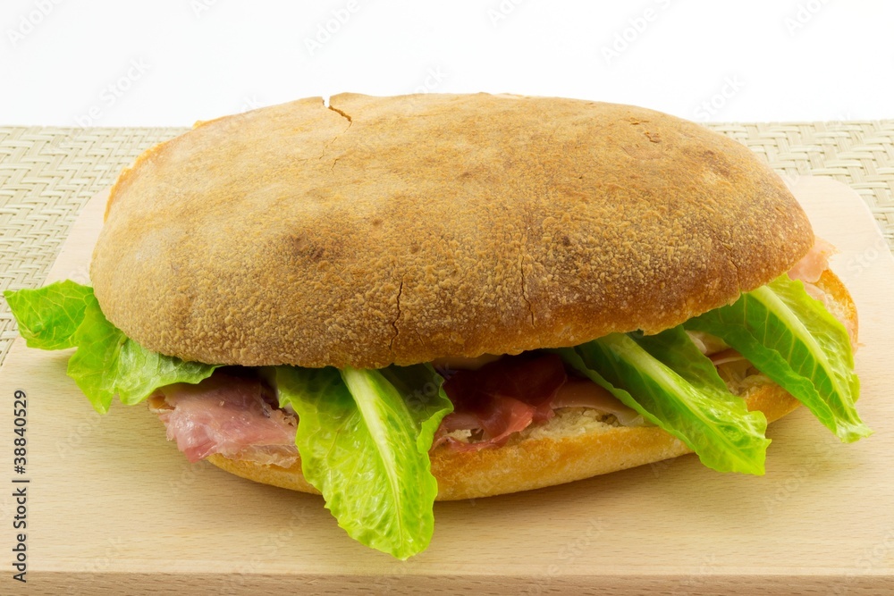 Panuozzo Panino Con Prosciutto Crudo Mozzarella E Lattuga Stock Photo Adobe Stock