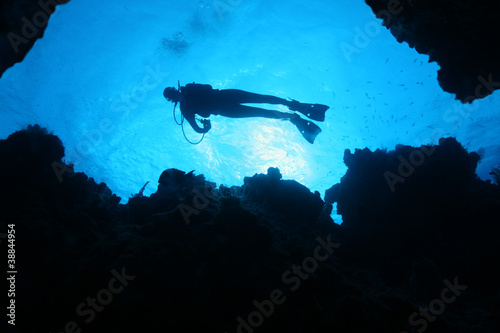 Silhouette of Scuba Diver Over a Coral Reef - Cozumel Mexico