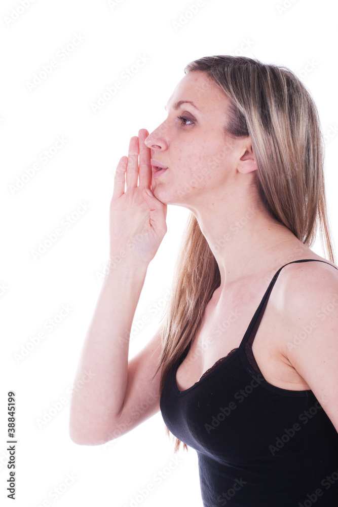 Portrait of the girl with a hand near a mouth