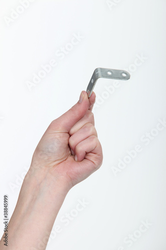 a hand showing an angle bracket