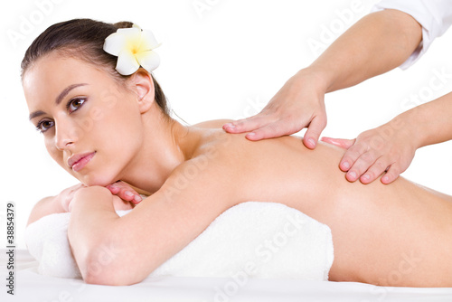 Young woman having massage on her back