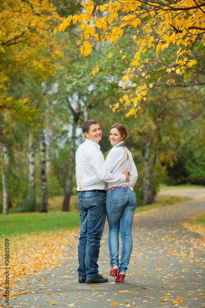 Romantic young beautiful couple on autumn walk Romantic young beautiful couple on autumn walk