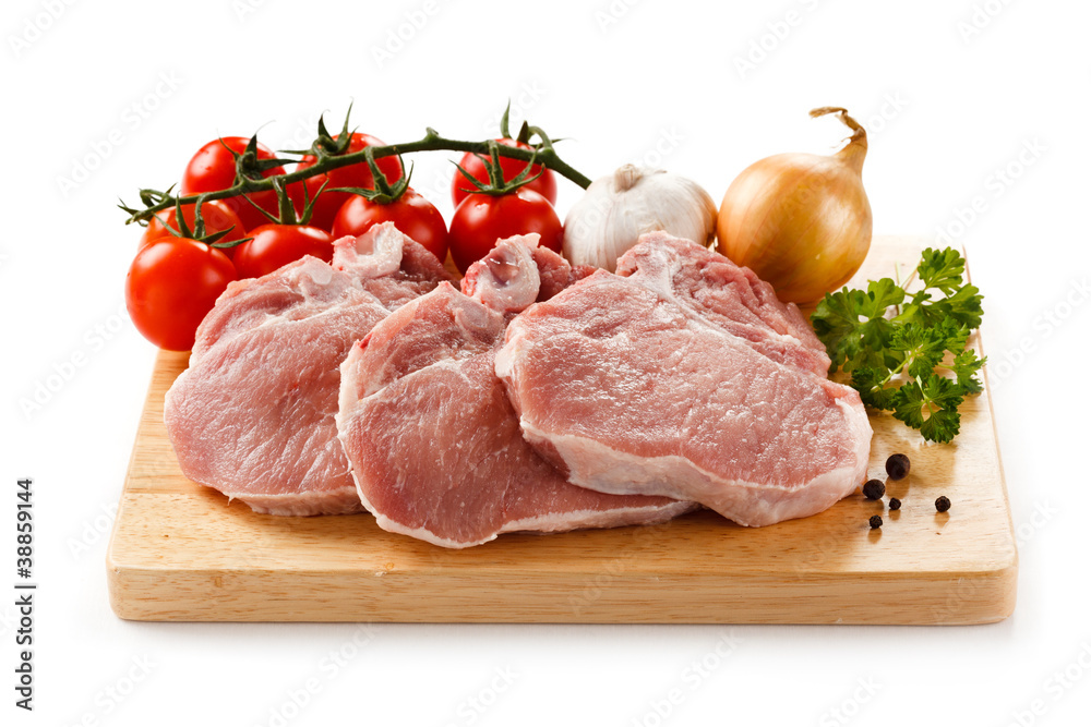Fresh raw pork on cutting board Fresh raw pork on cutting board