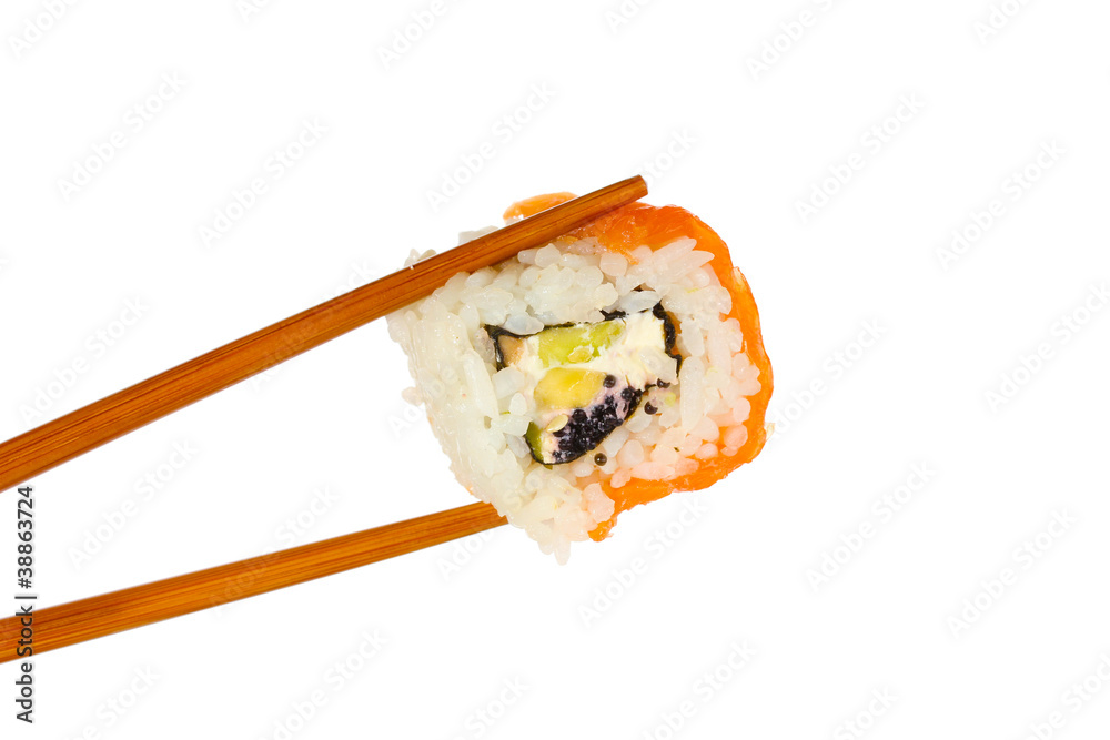 Holding roll with chopsticks isolated on white Holding roll with chopsticks isolated on white