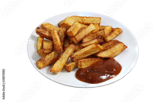 Plate of fried French fries with bright red sauce