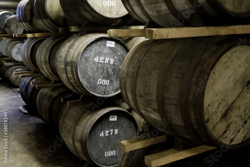 Fotografie, Tablou Whisky barrels in a distillery