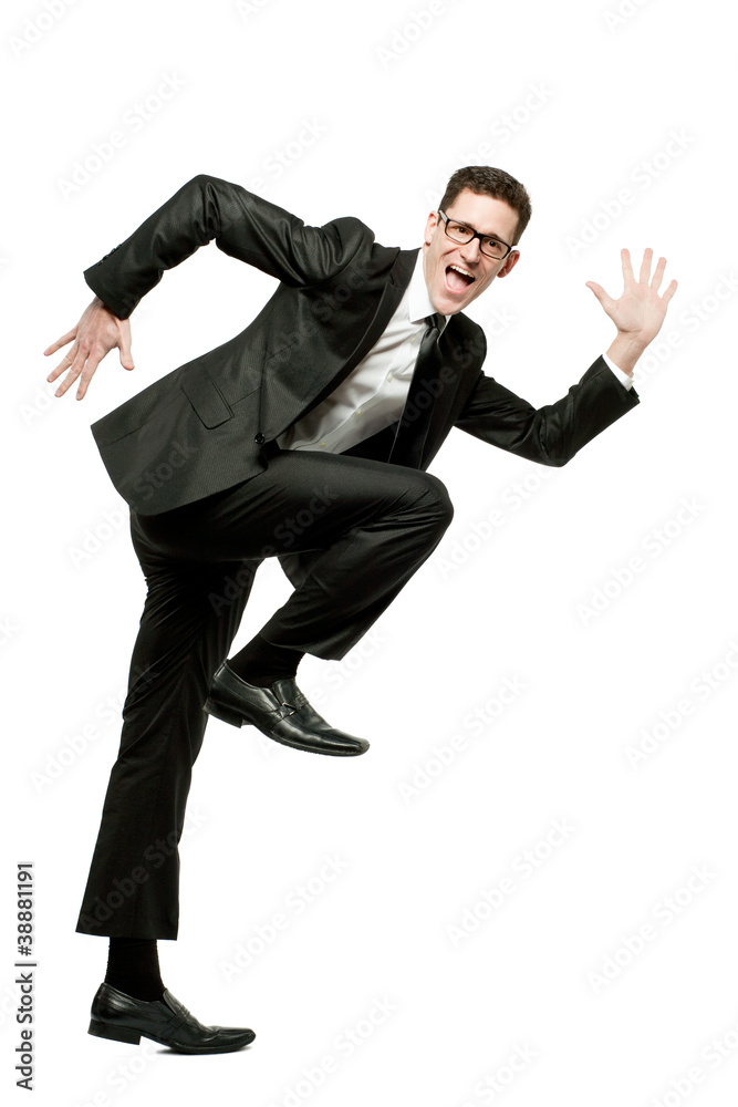 Happy businessman runs in black suit on white. Happy businessman runs in black suit on white.