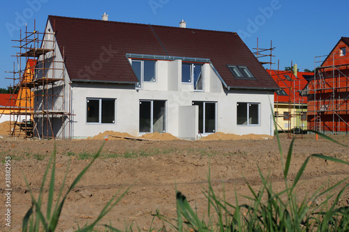 Construction of semi-detached houses in the suburbs photo