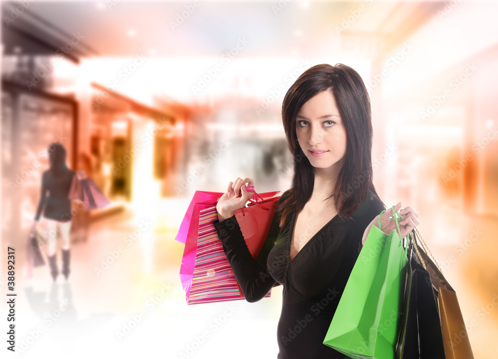 Shopping young woman in the shopping mall. Shopping young woman in the shopping mall.