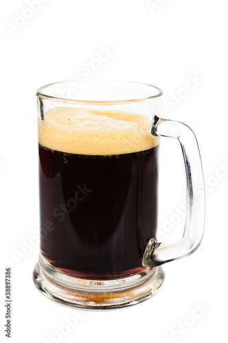 Dark beer. Photo pour beer into a glass