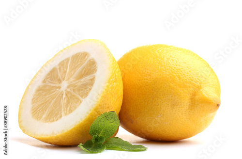 Fresh lemon with mint isolated on white