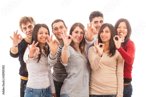 Happy Multiracial Group showing Ok Sign