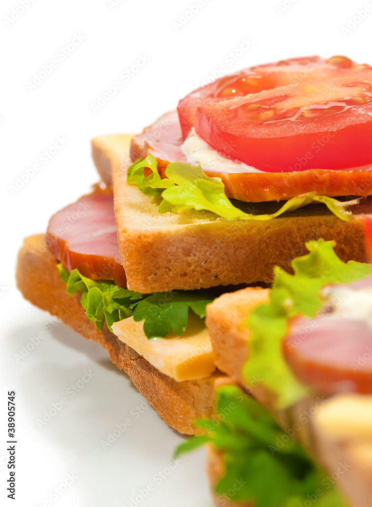 Ham sandwich with cheese, tomatoes and lettuce Ham sandwich with cheese, tomatoes and lettuce