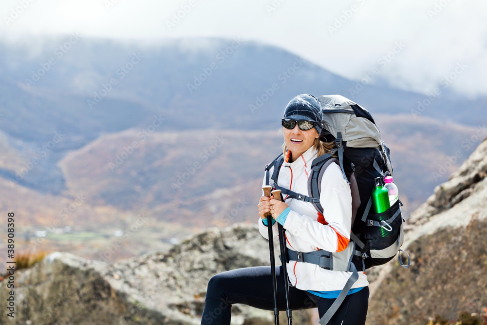 Woman trekking in Himalaya Mountains