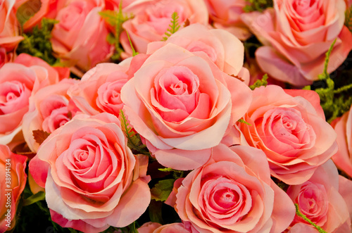 Pink roses mean love is beginning to grow on mind.