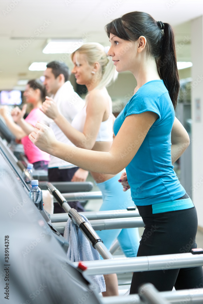 people in gym on treadmill running people in gym on treadmill running