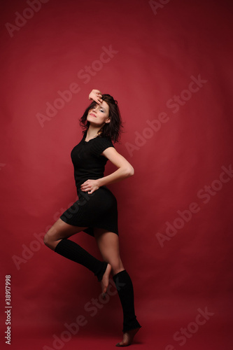 attractive young woman dancing © Dmytro Shevchenko