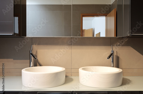 .beautiful apartment  interior  bathroom  two sinks and mirror